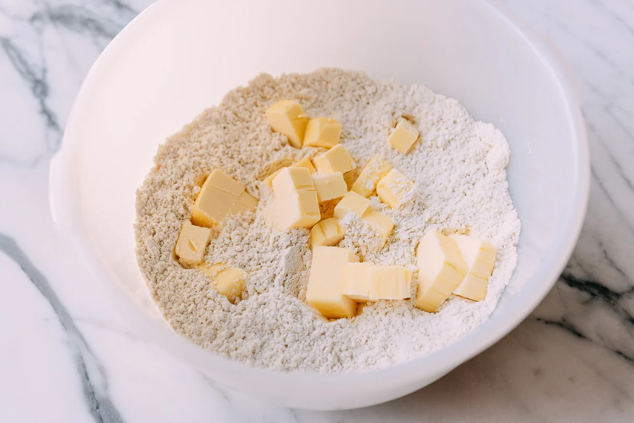 Butter cubes added to flour mixture