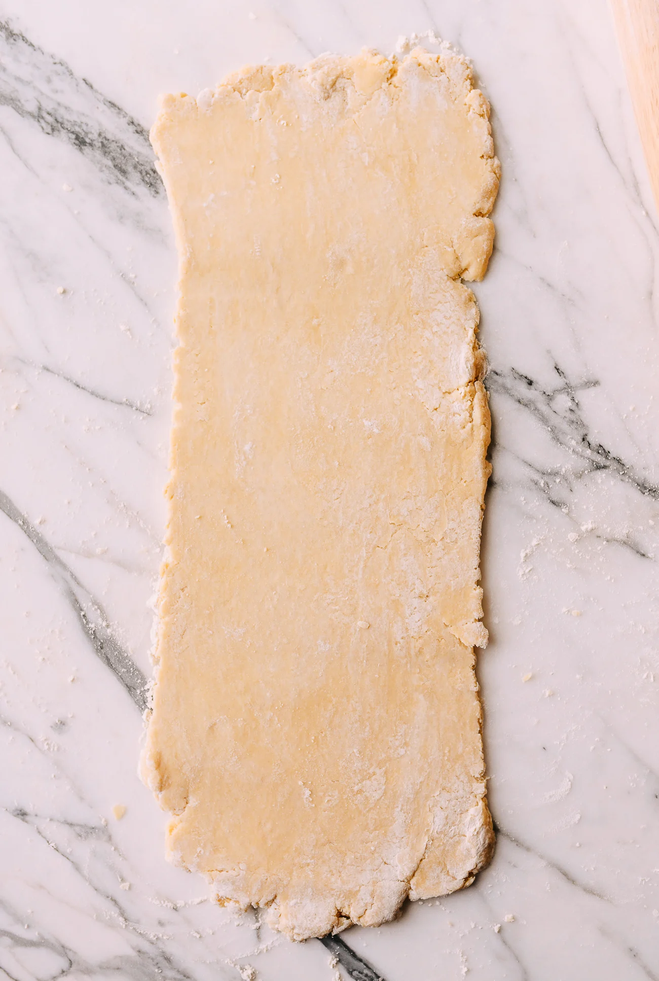 Dough rolled into long rectangle